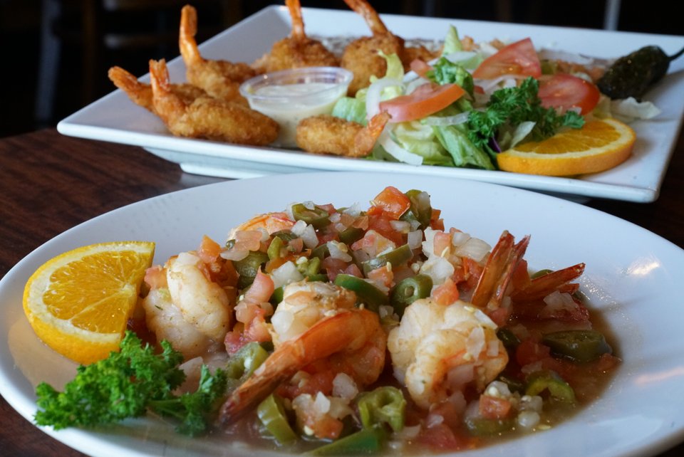 Seafood dishes on a restaurant table